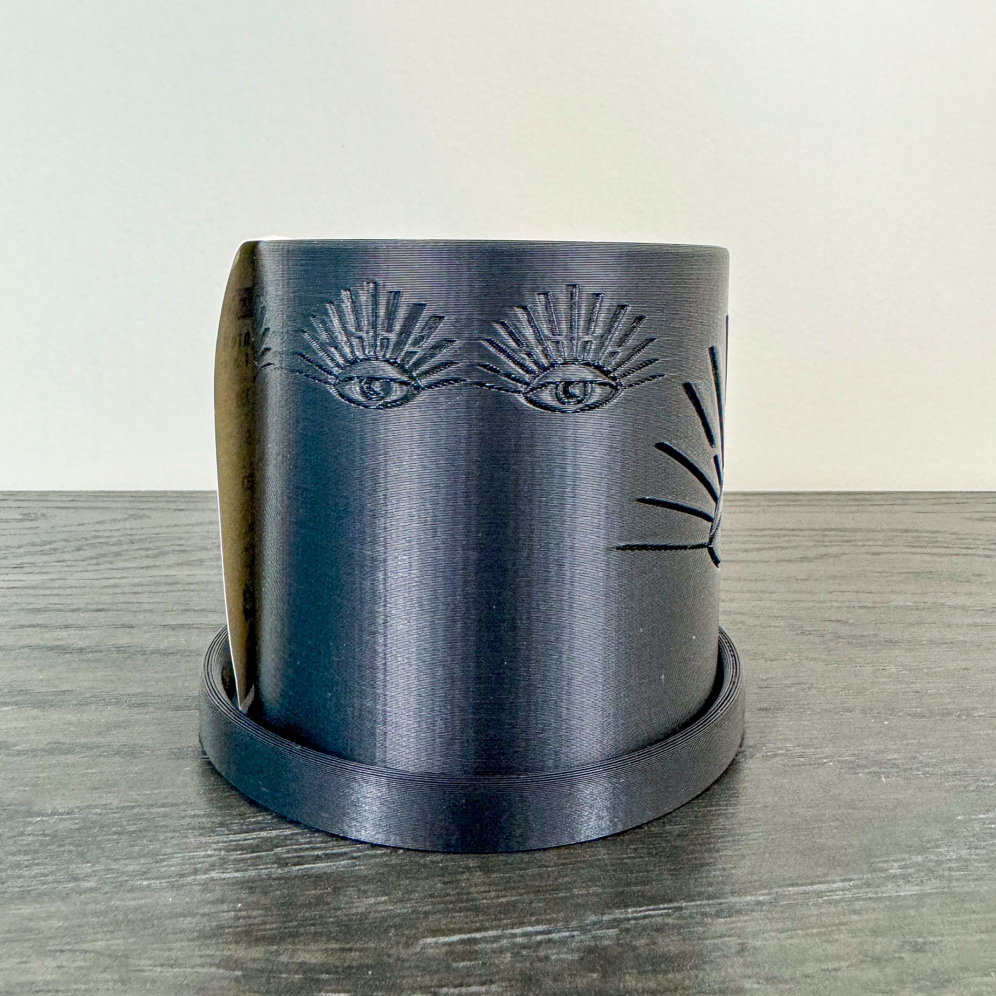 Black 3D printed eye planter