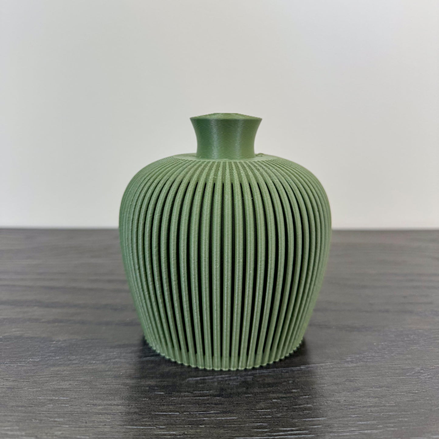 Green 3D printed water bell thumb pot
